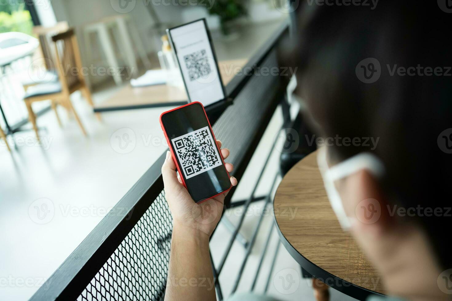 Qr code payment. E wallet. Man scanning tag accepted generate digital pay without money.scanning QR code online shopping cashless payment and verification technology concept photo