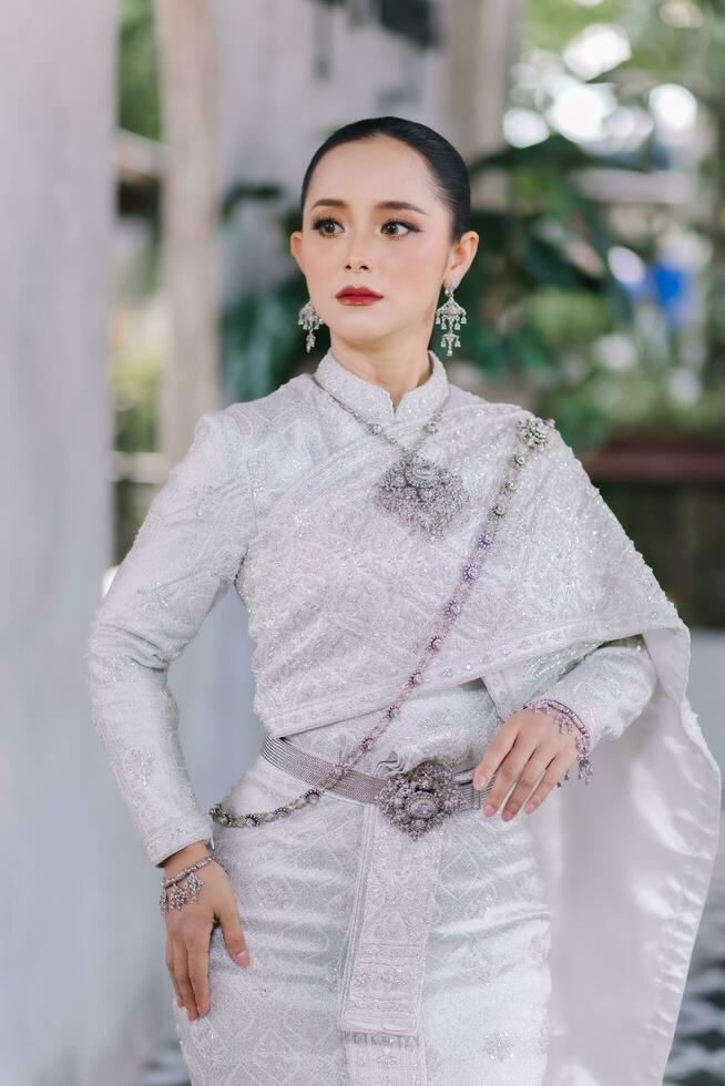 Beautiful Thai girl in Thai traditional costume.Bride Thai girl Beautiful. photo