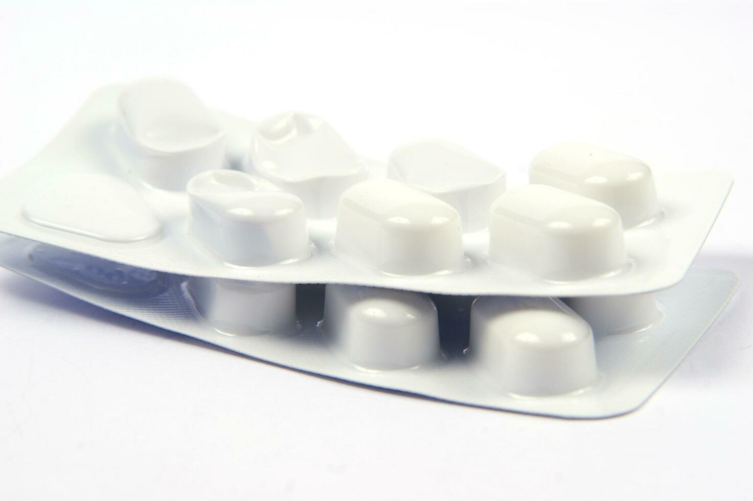 a close up of pills in a pack photo