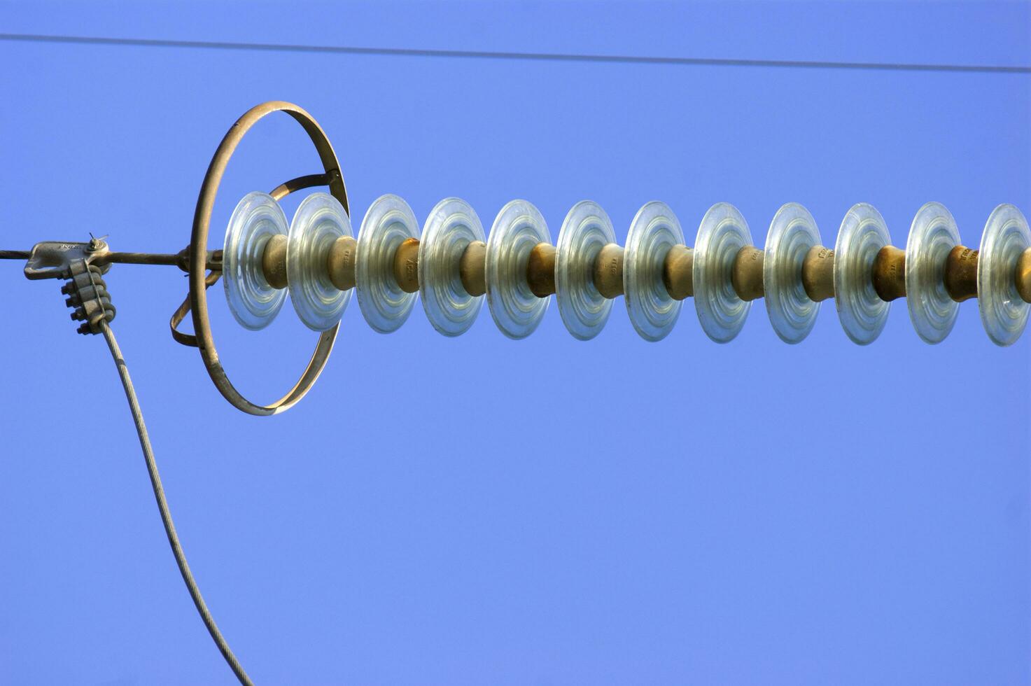 a close up of a power line with wires attached photo