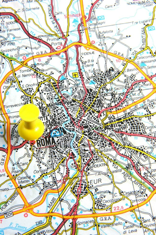 a red push pin is on a map of a city photo