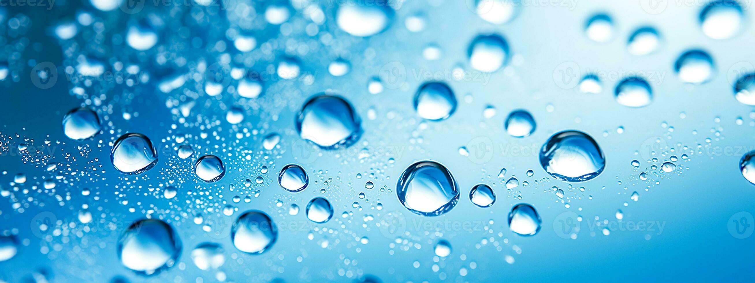 transparent water drops in the air, blue banner as background photo