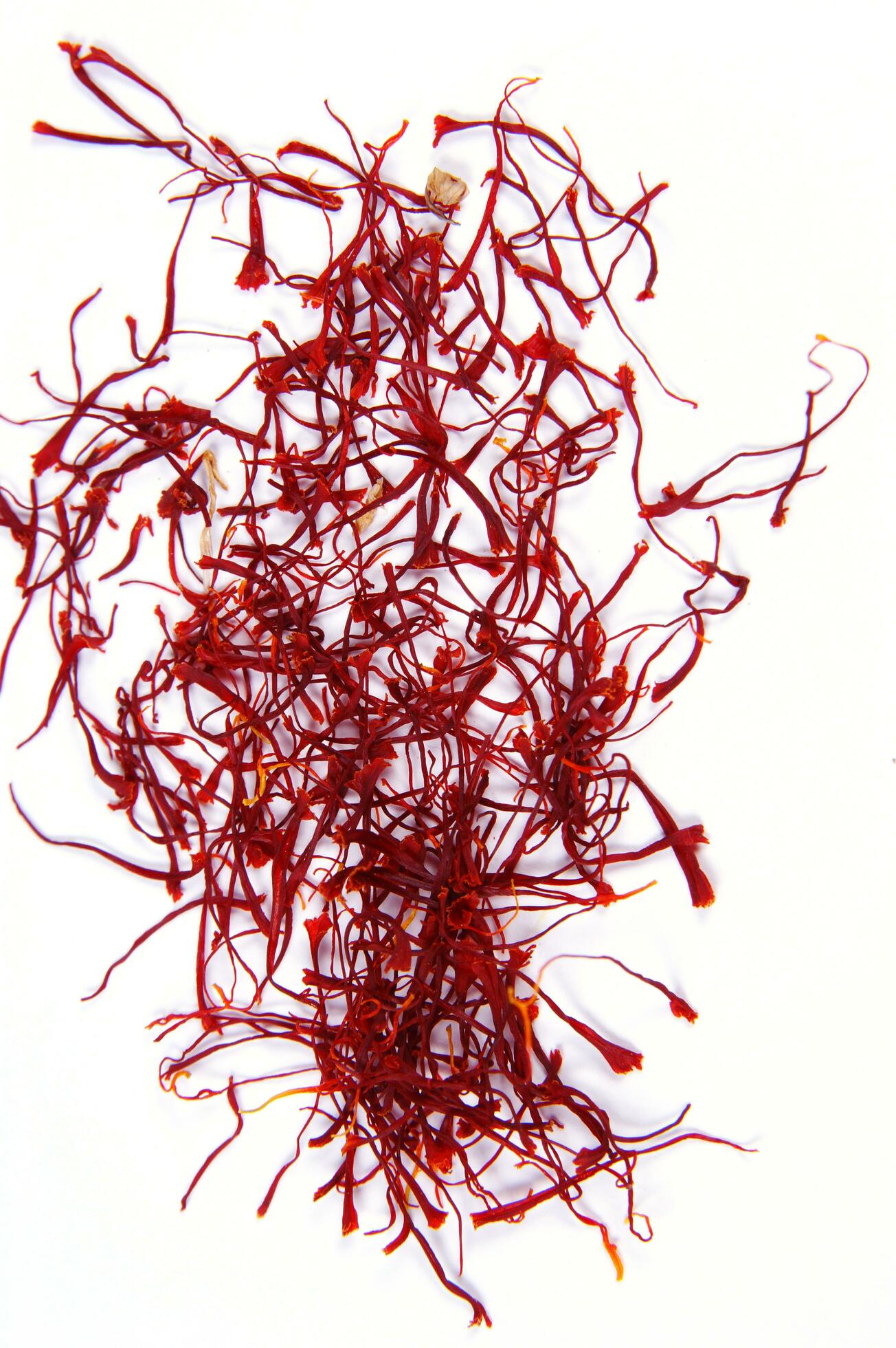 a pile of red saffron on a white background 30744190 Stock Photo at