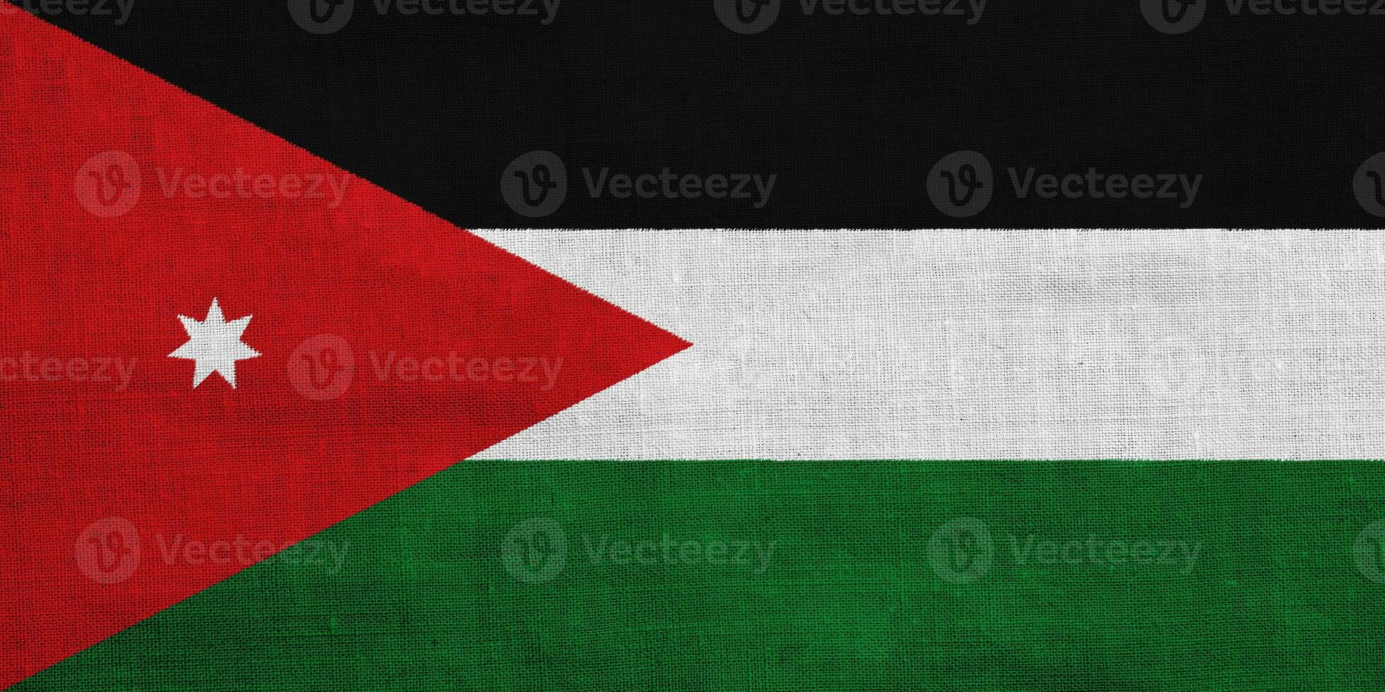 Flag of Hashemite Kingdom of Jordan on a textured background. Concept collage. photo