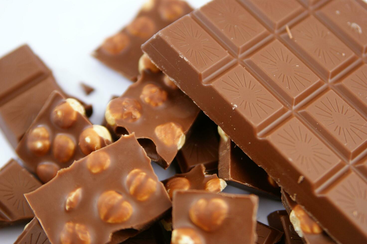 a bar of dark chocolate is shown on a white background photo