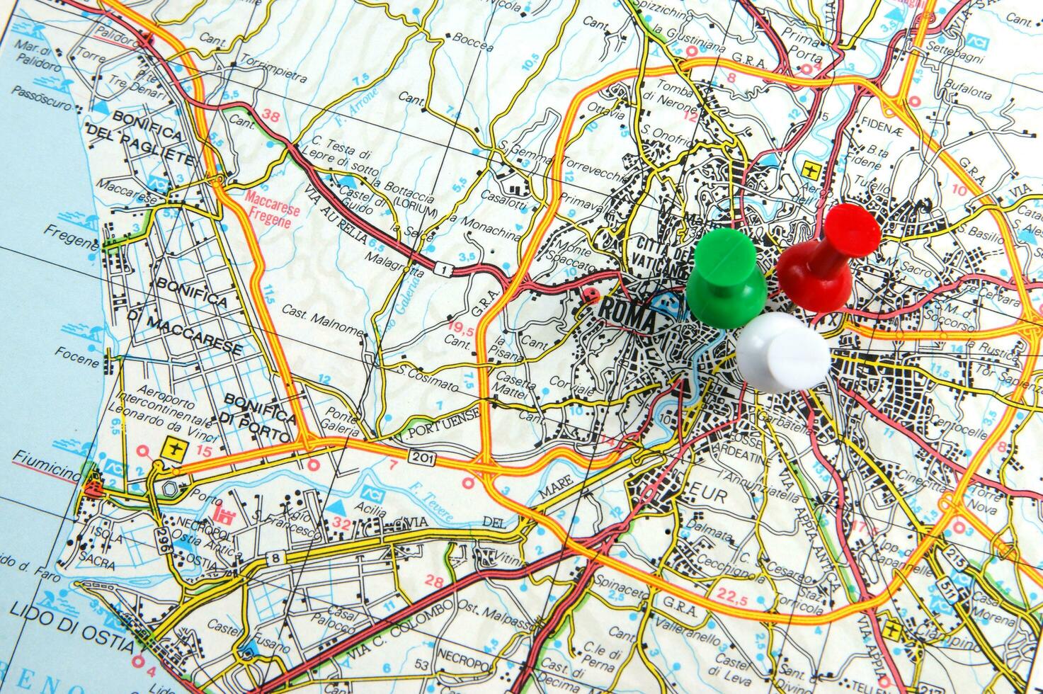 a red push pin is on a map of a city photo