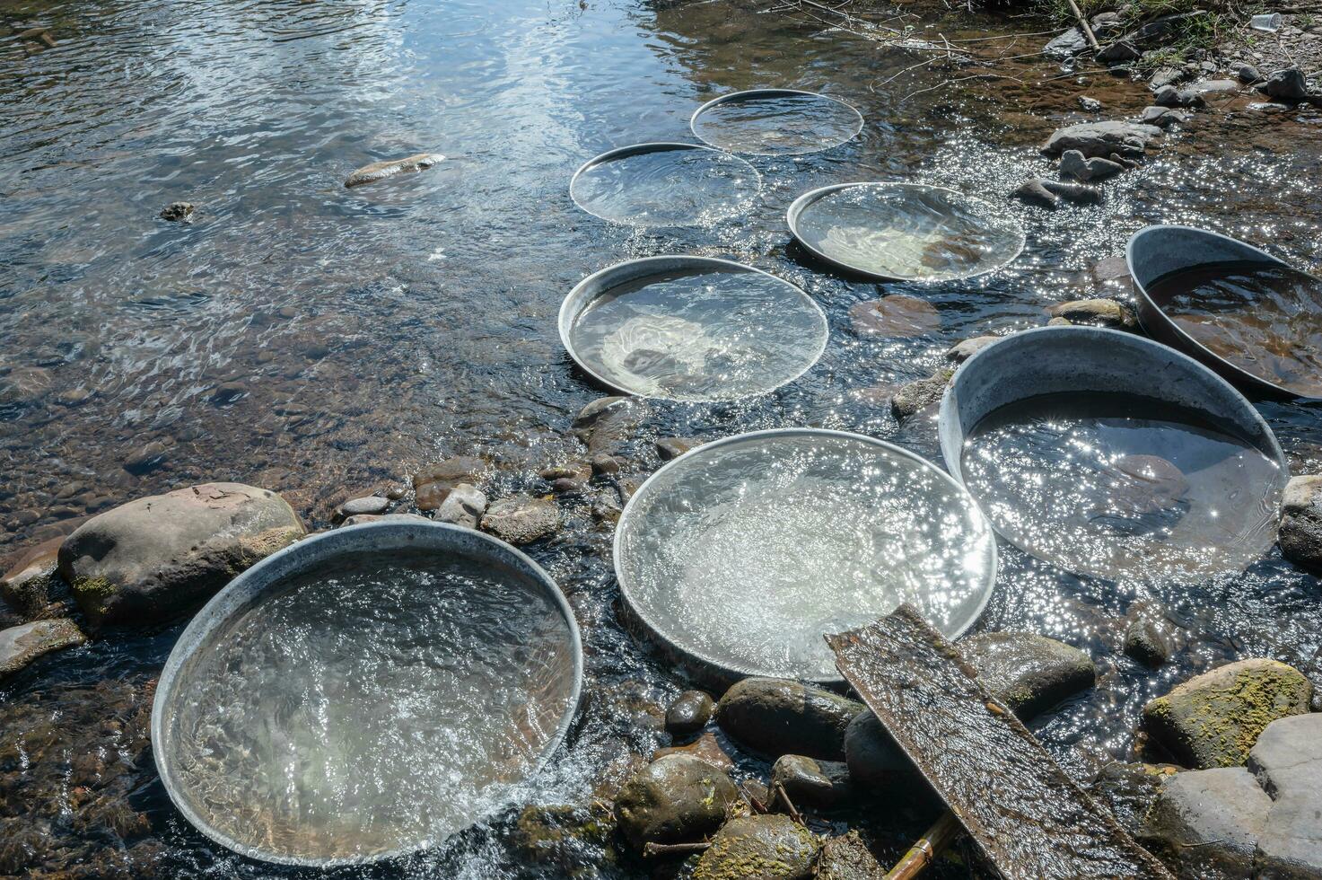 stainless steel basin in river of Boklua Village At nan Thailand.Boklua is ancient salt well in thailand .Thailand destination travel photo