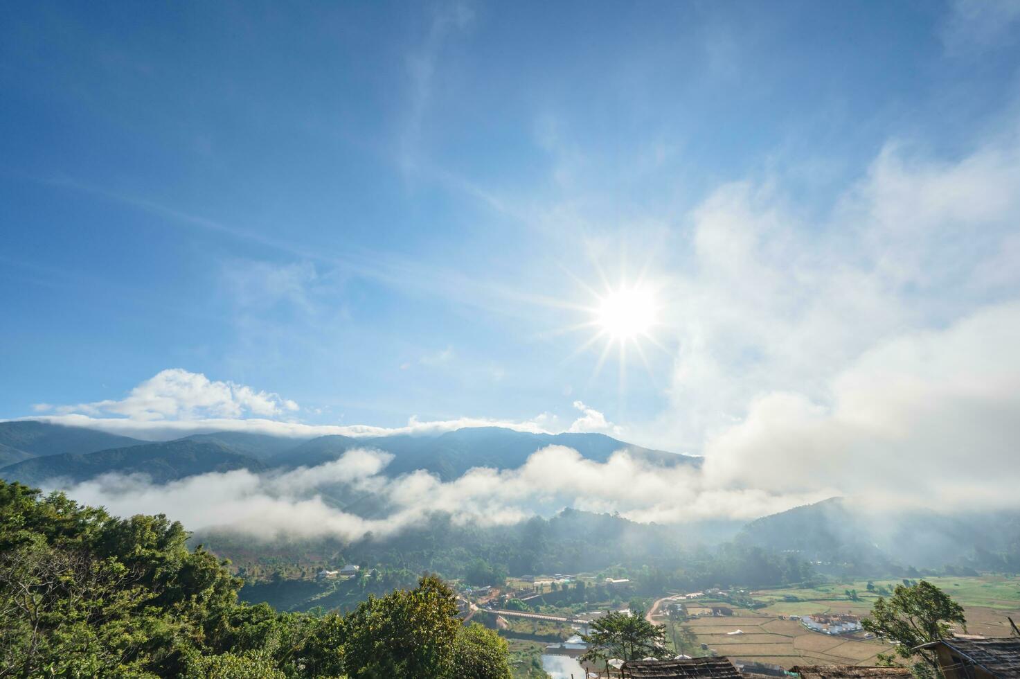 Beautiful landscape view and mist cover the mountain at Sapan Village nan Thailand.Sapan is Small and tranquil Village in the mountain. photo