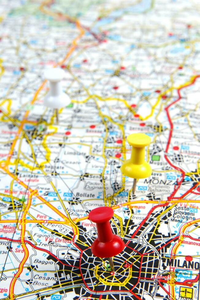 a red push pin is on a map of a city photo