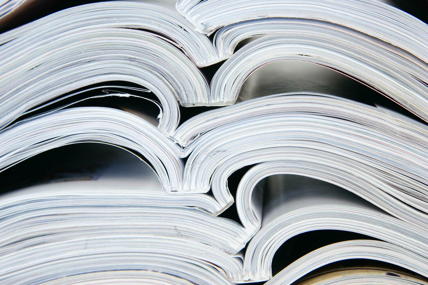 a stack of magazines is shown in this photo