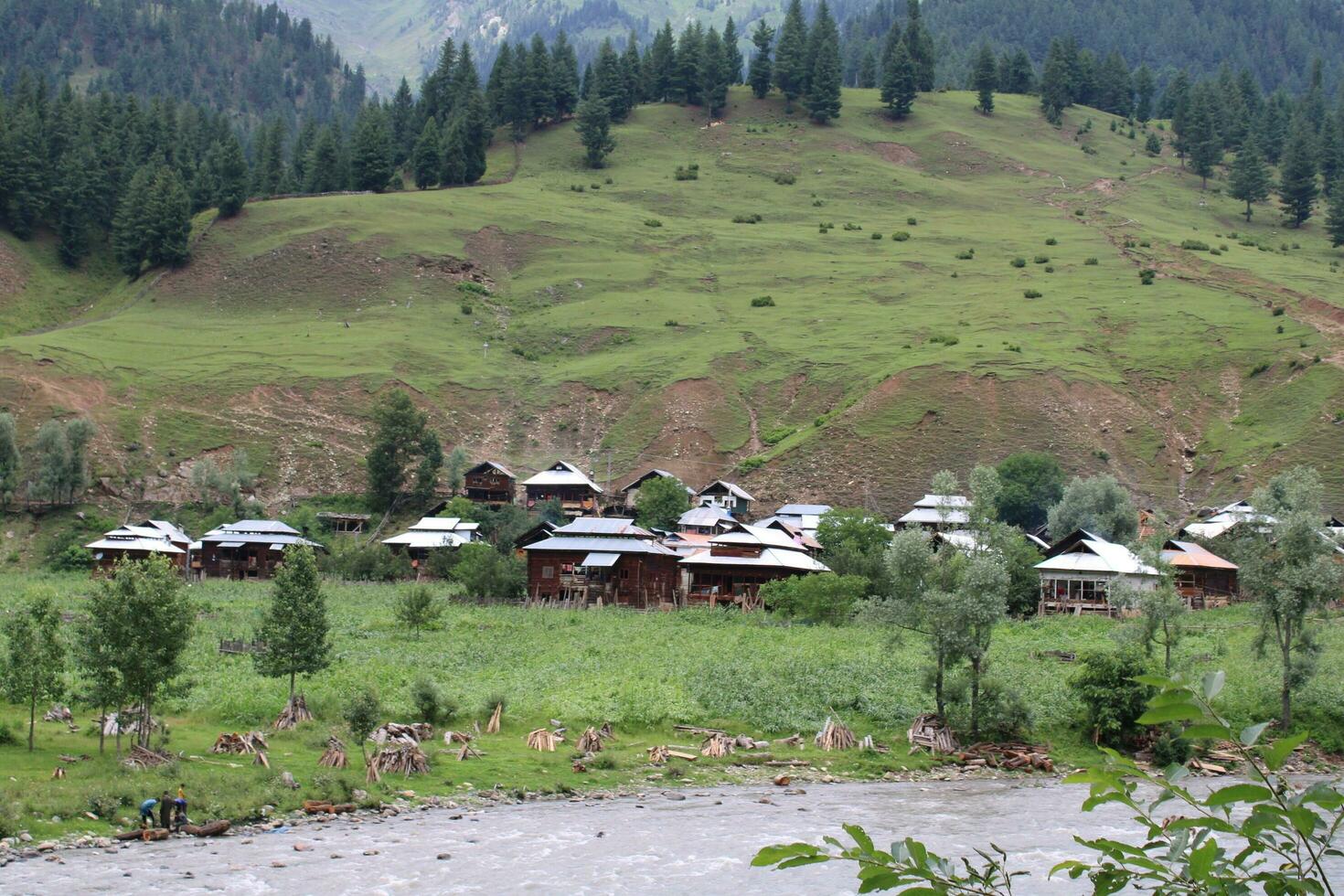 Scenic view of the natural beauty of Tao Butt, Neelum Valley, Kashmir.  Tao Butt is famous for its lush green trees and natural beauty. photo