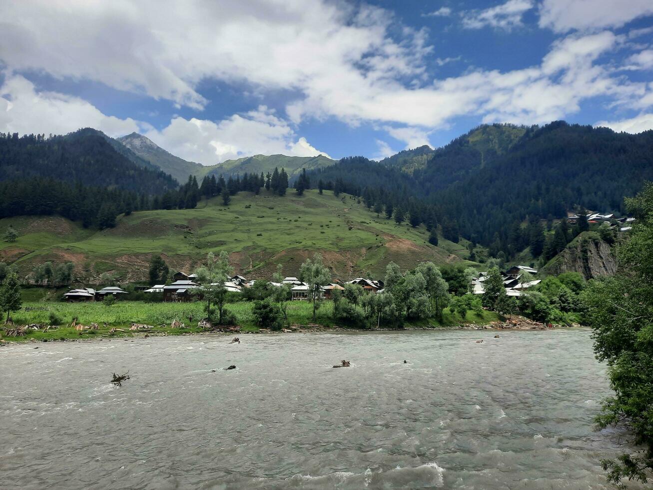 Scenic view of the natural beauty of Tao Butt, Neelum Valley, Kashmir.  Tao Butt is famous for its lush green trees and natural beauty. photo