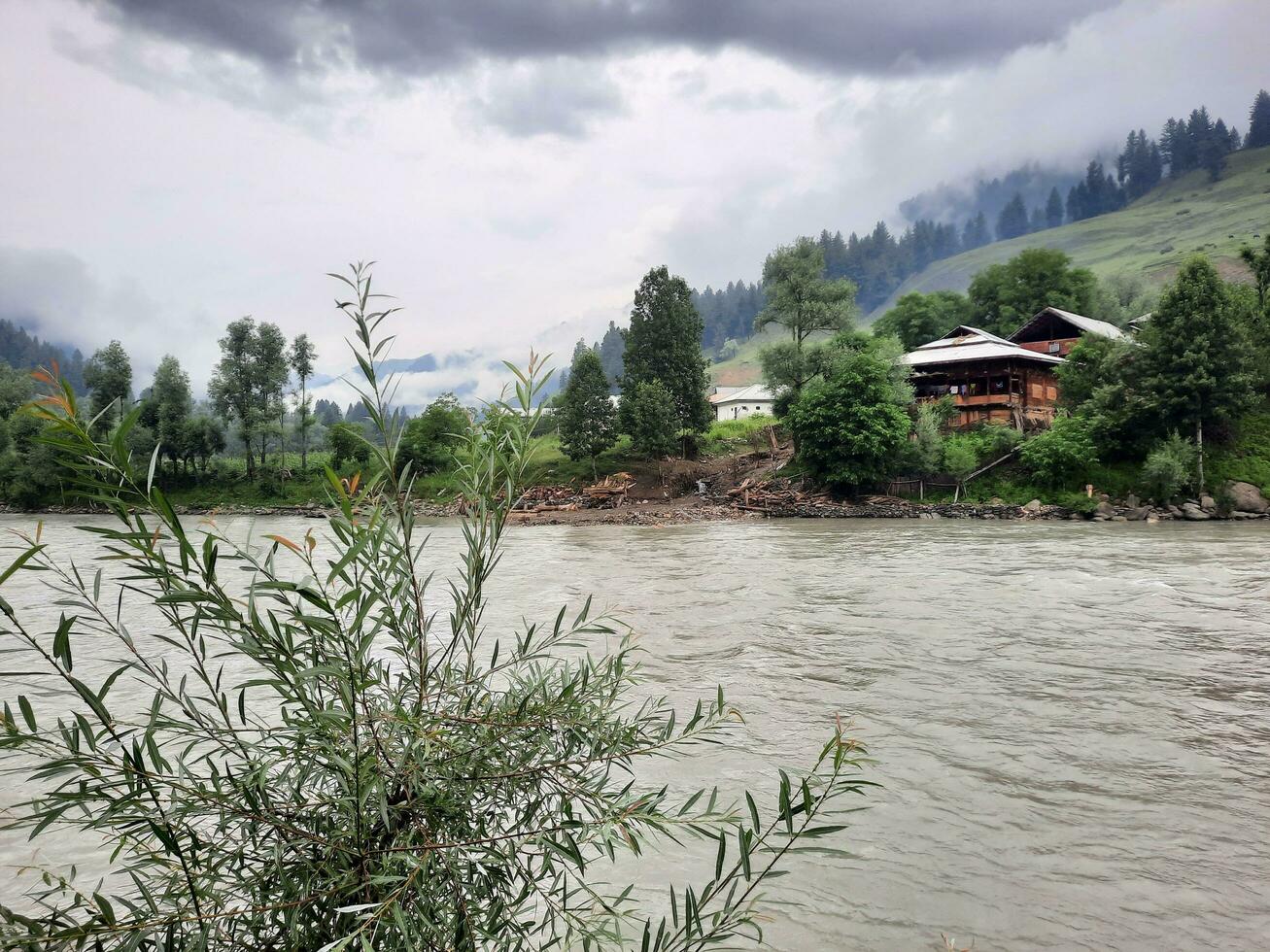 Scenic view of the natural beauty of Tao Butt, Neelum Valley, Kashmir.  Tao Butt is famous for its lush green trees and natural beauty. photo