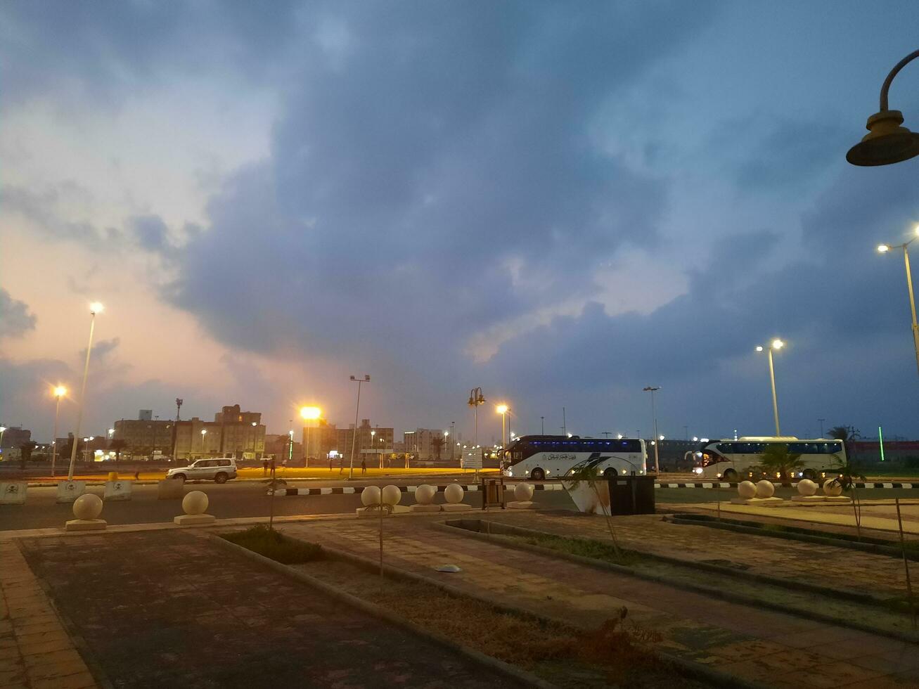 Beautiful morning view of Al Qunfudhah Beach, Saudi Arabia. The lights on the beach are creating a beautiful scene in the morning. photo