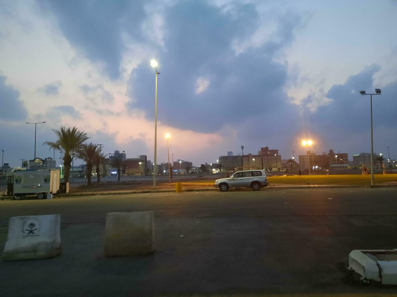 Beautiful morning view of Al Qunfudhah Beach, Saudi Arabia. The lights on the beach are creating a beautiful scene in the morning. photo