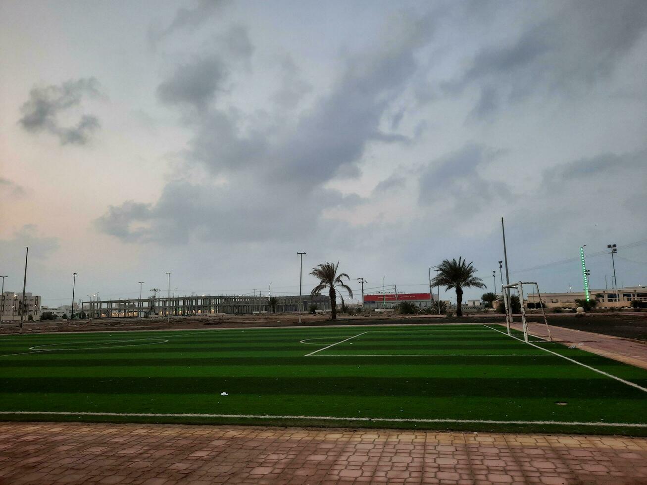 Beautiful morning view of Al Qunfudhah Beach, Saudi Arabia. The lights on the beach are creating a beautiful scene in the morning. photo