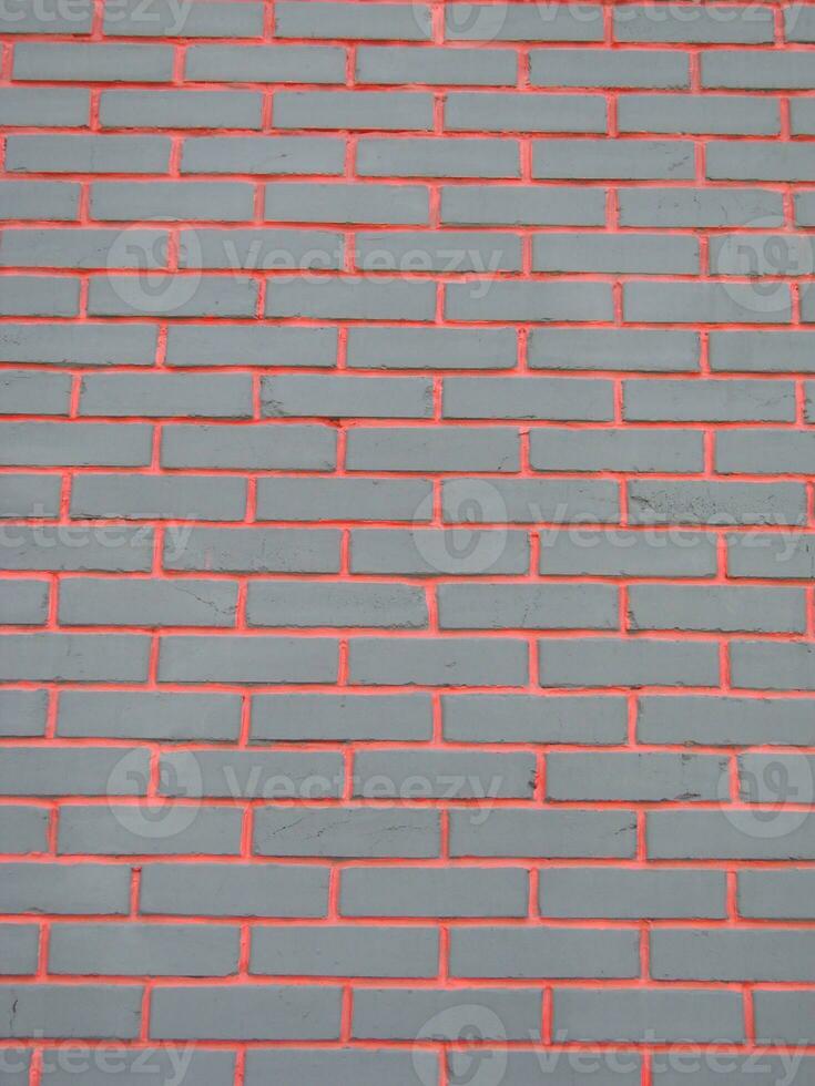 Black brick wall with red veins grunge texture background, can be used for interior design photo