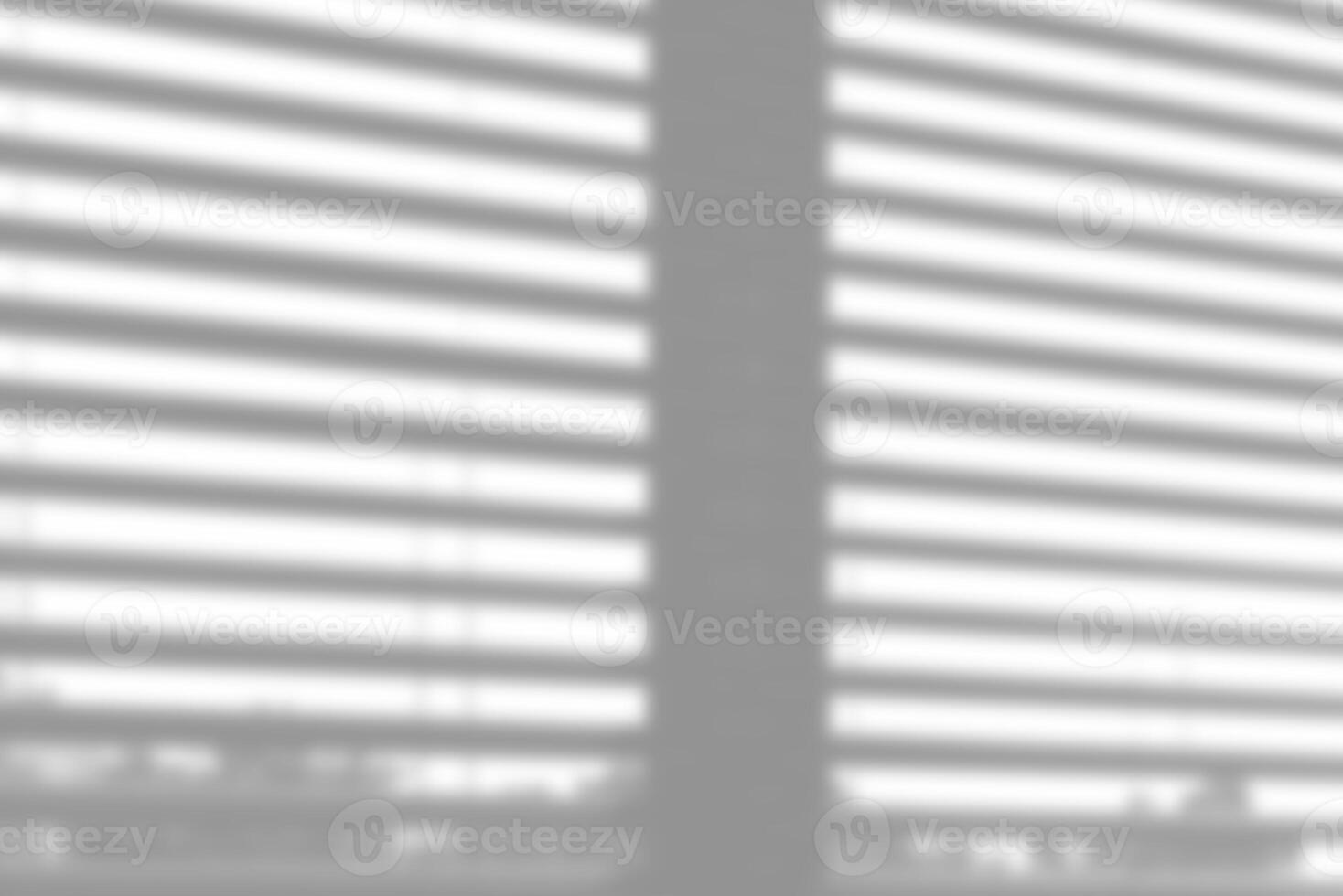 blur background. Abstract shadow of the window in morning light on white wall texture photo