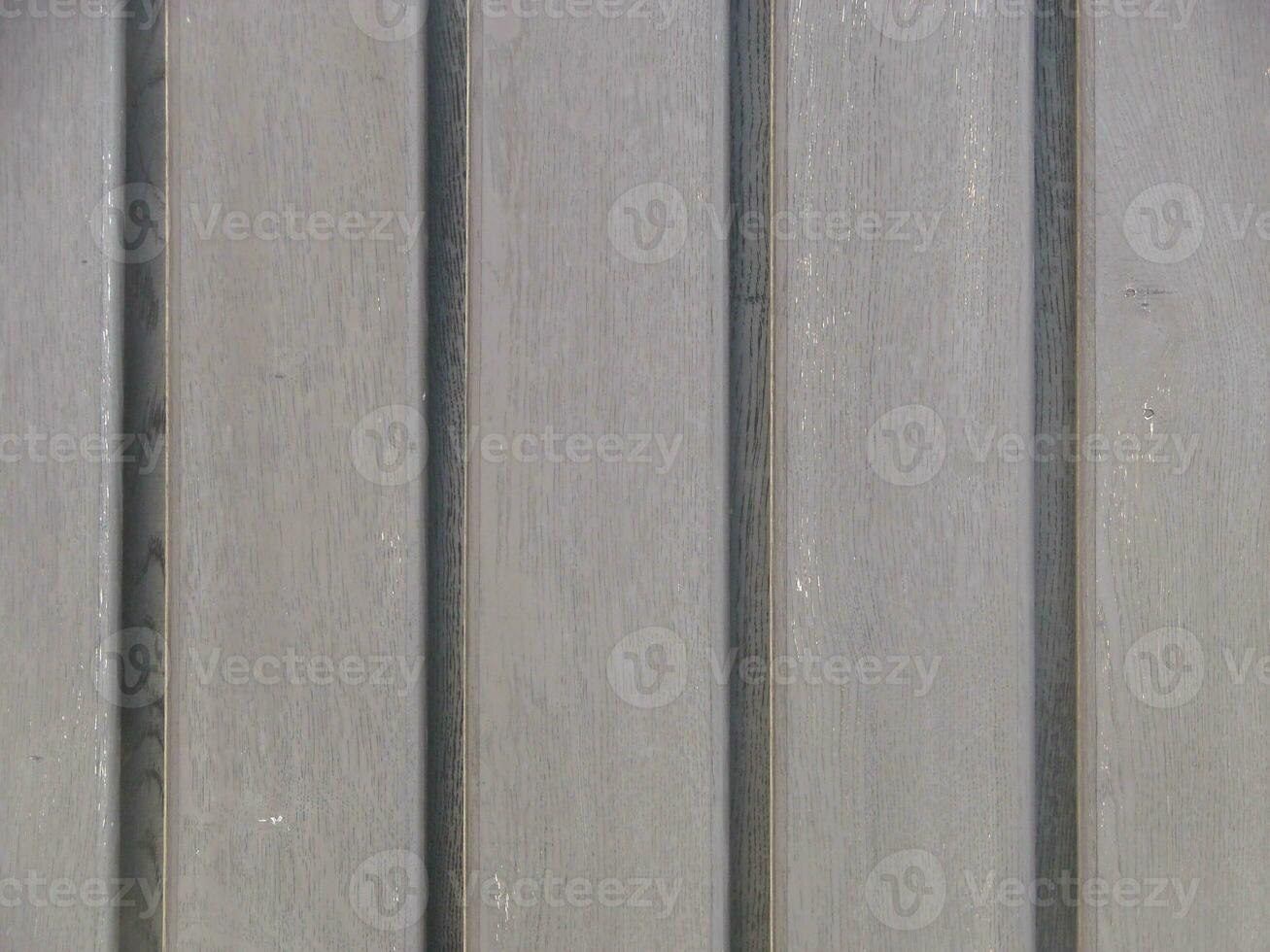 Seamless pattern of modern wall covering with vertical wooden slats for background. photo