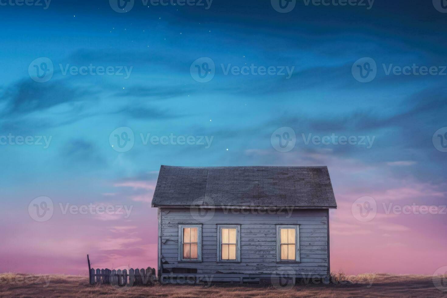 Decomposed vintage cottage facade isolated on a gradient twilight sky background photo