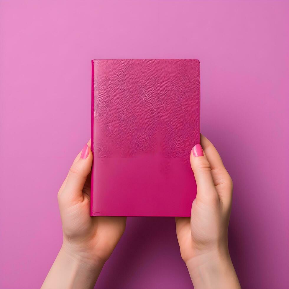 female  hands holding a small notebook or passport. genarative ai photo