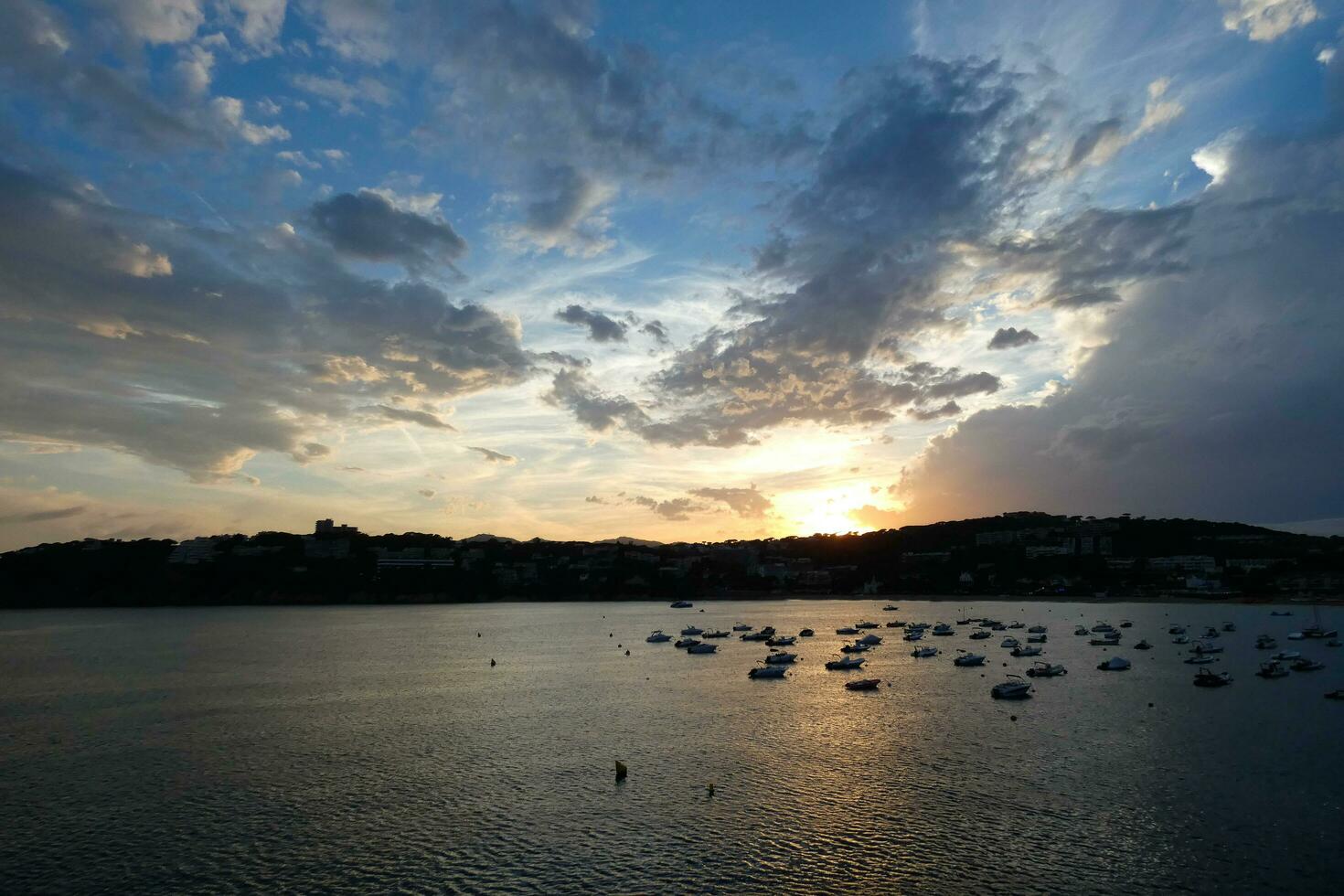 Clouds and light effects in the sky at dawn or dusk. photo