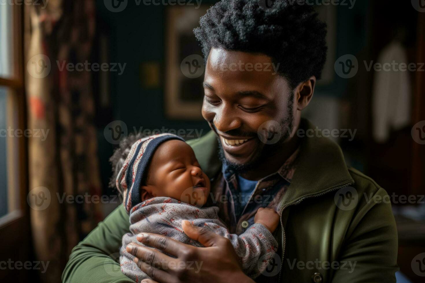 African father cherishing moment with newborn baby in their home photo