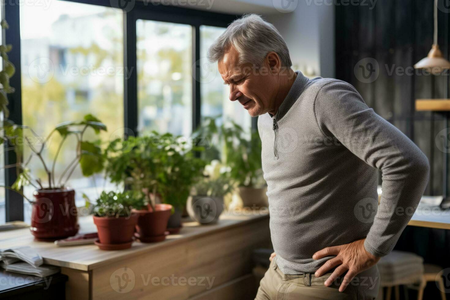 Man at home with backache kidney inflammation causing pain 30767186