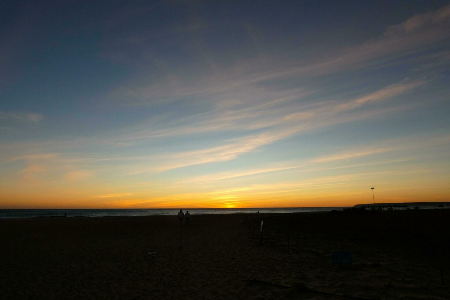 sunset and sunset on the sea photo