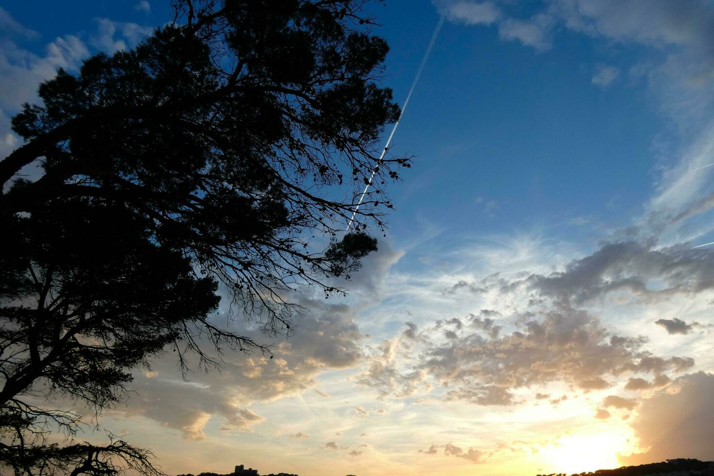 Clouds and light effects in the sky at dawn or dusk. photo