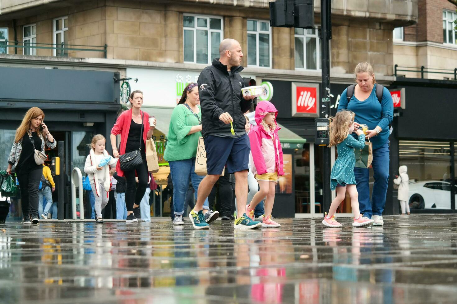 Most Beautiful Image of International and Local Tourist People are Visiting The Central London Capital City of England UK During Rainy Day. Captured on August 2nd, 2023 photo