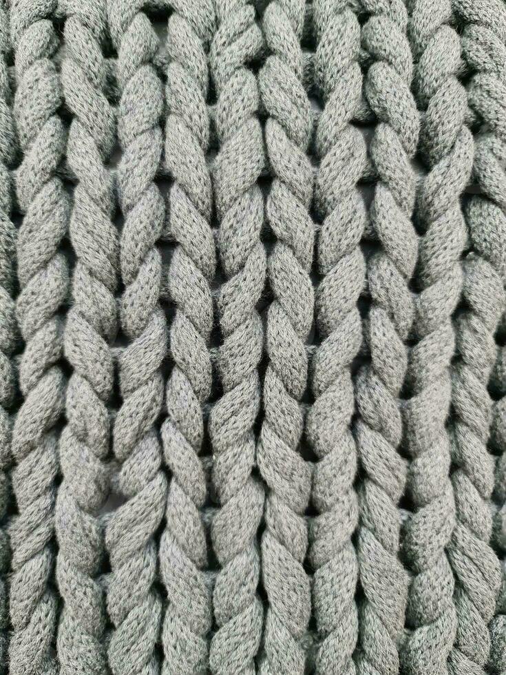 Detailed close up view on samples of cloth and fabrics in different colors found at a fabrics market photo