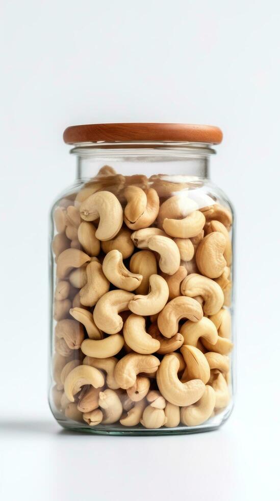 Cashew nuts in a glass jar on a white background AI Generated photo