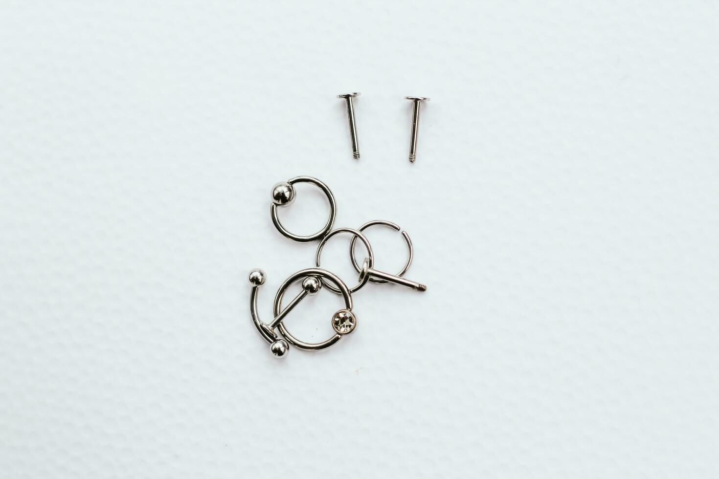 Earrings and rings made of medical steel for piercing photo