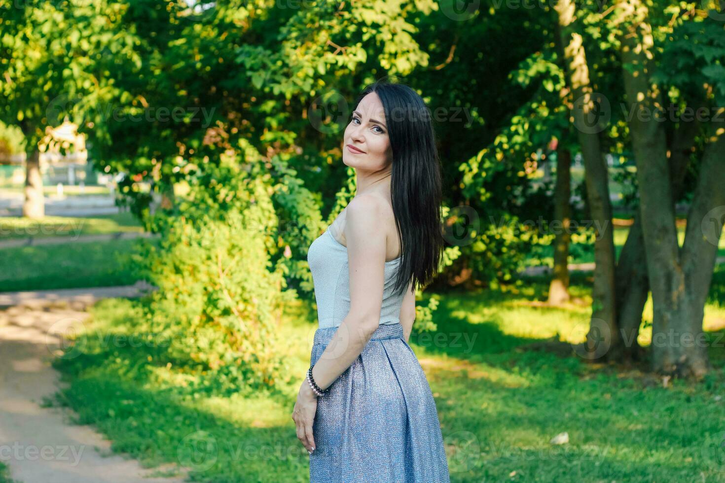 Portrait of a beautiful woman with long black hair photo