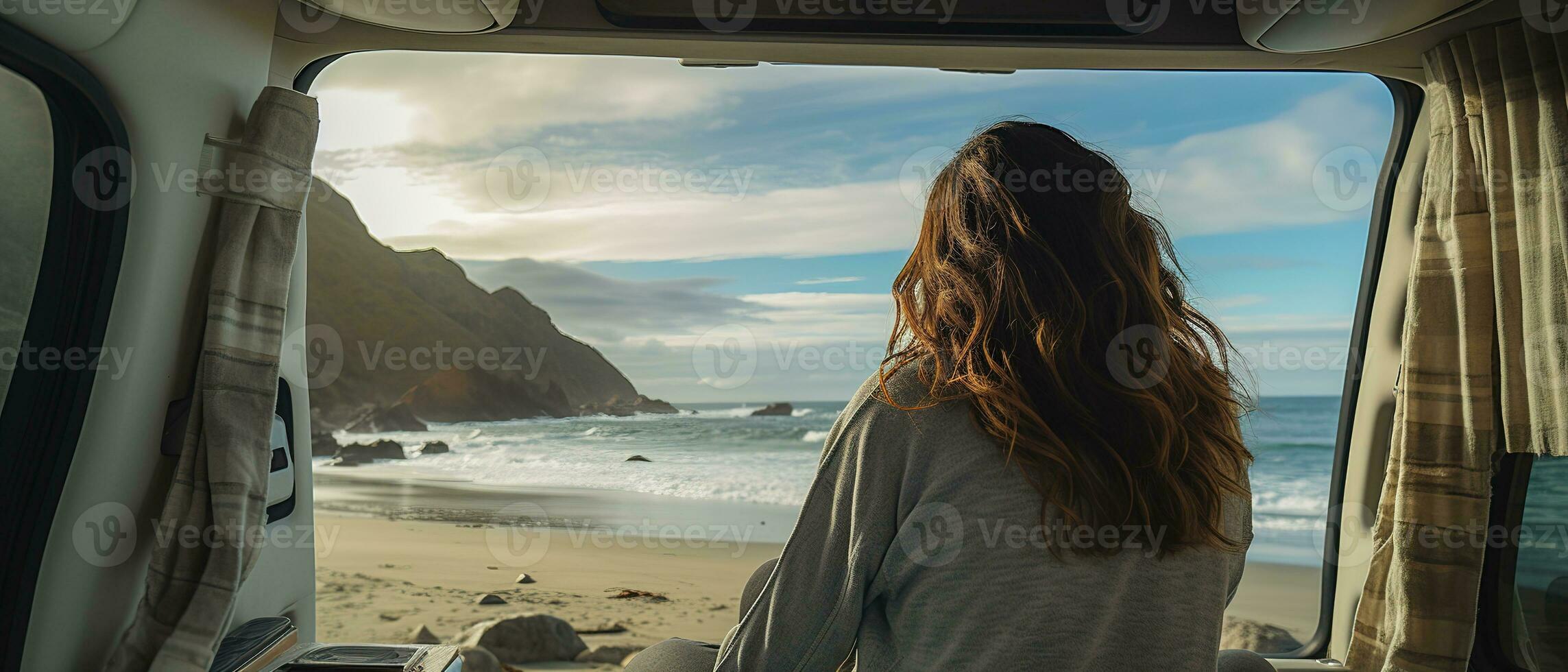 Young woman in her camper enjoying a scenic beach view, a tranquil moment of wanderlust and adventure. Generative AI photo
