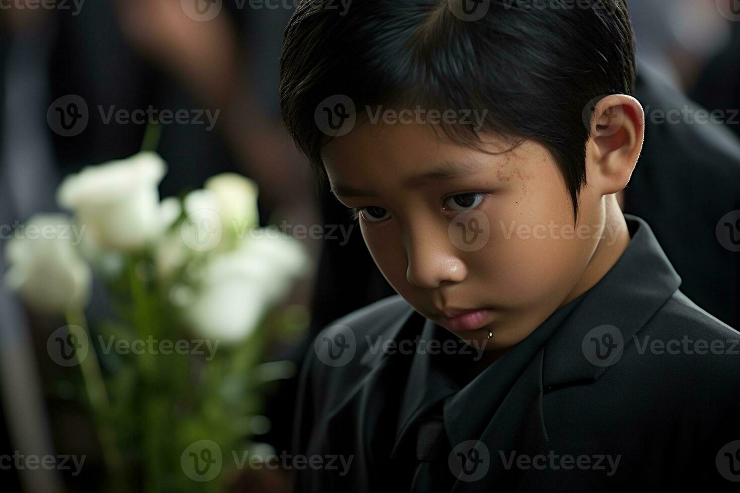 Portrait of little asian boy with sad expression.Funeral concept AI generated photo