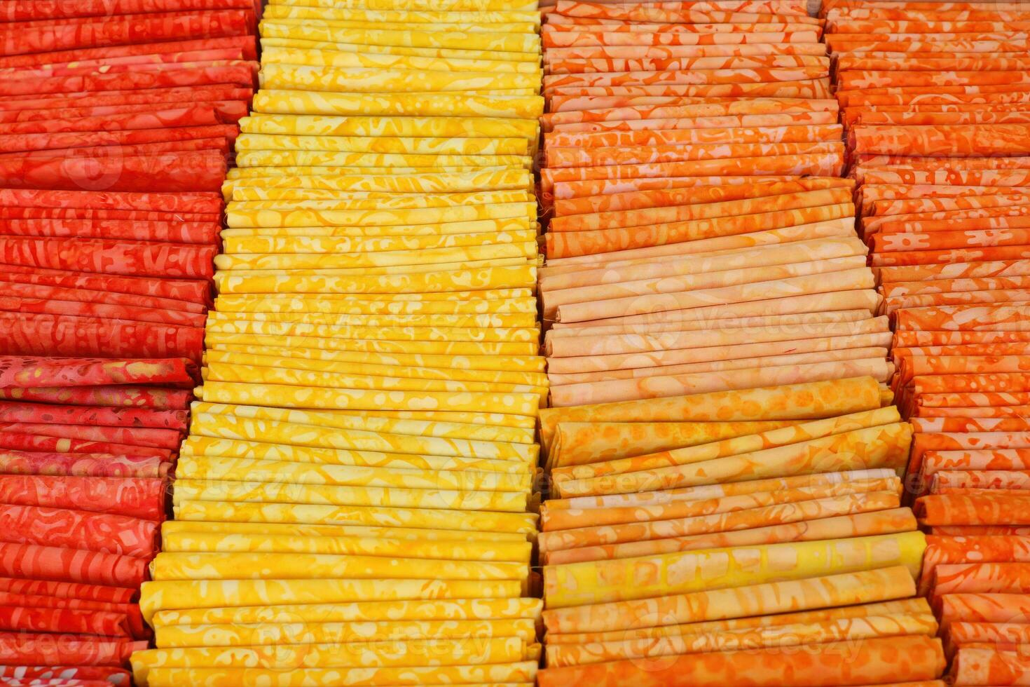 Close up view on samples of cloth and fabrics in different colors. photo