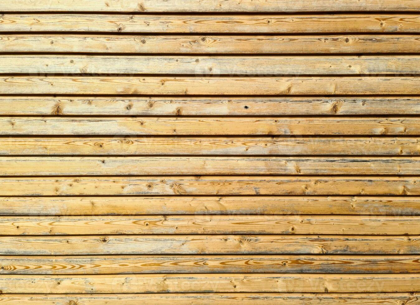 A large pile of wood on sale in a wholesale shop. photo