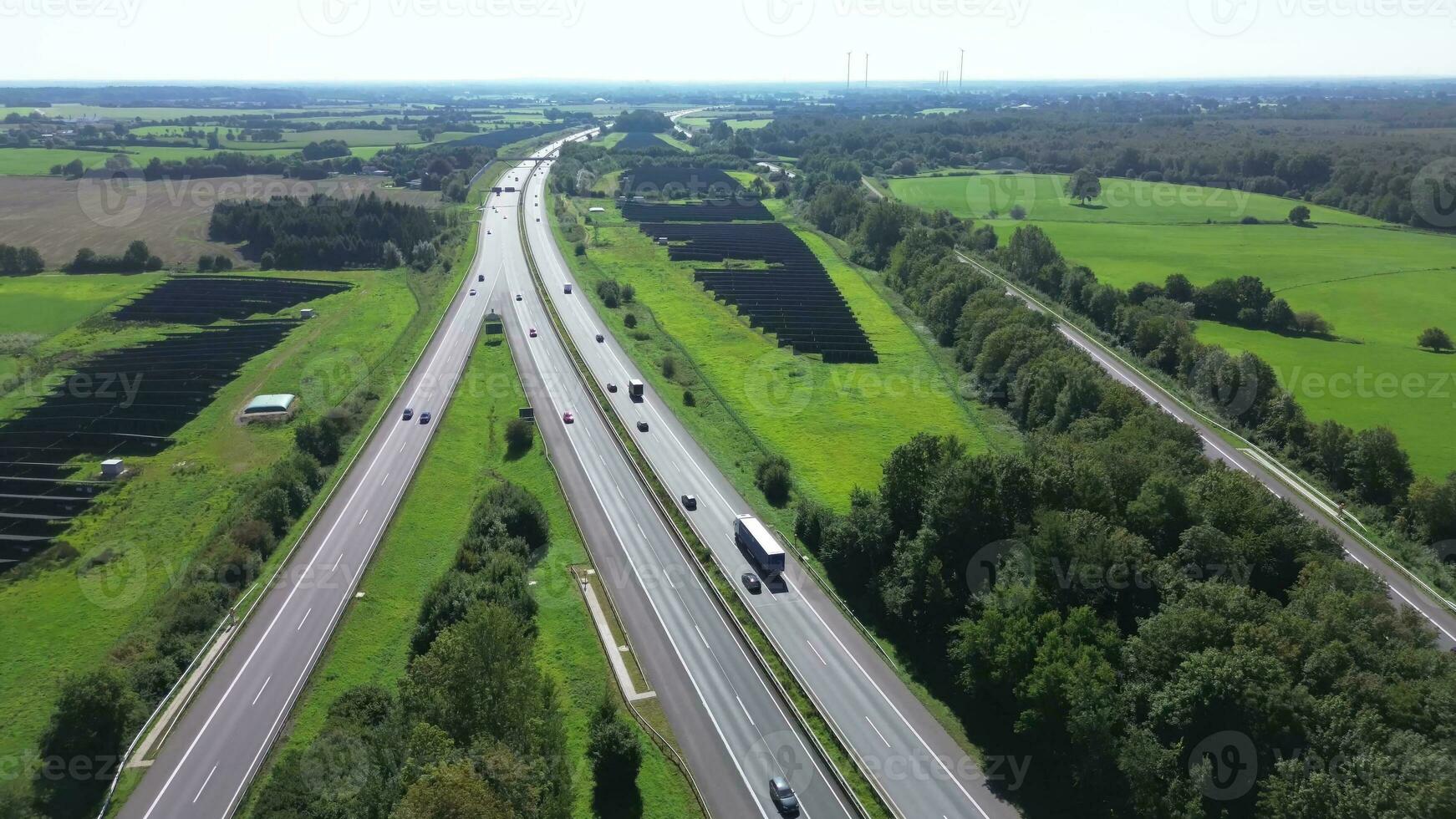Aerial view on the A7 motorway in northern Germany between fields and meadows. photo