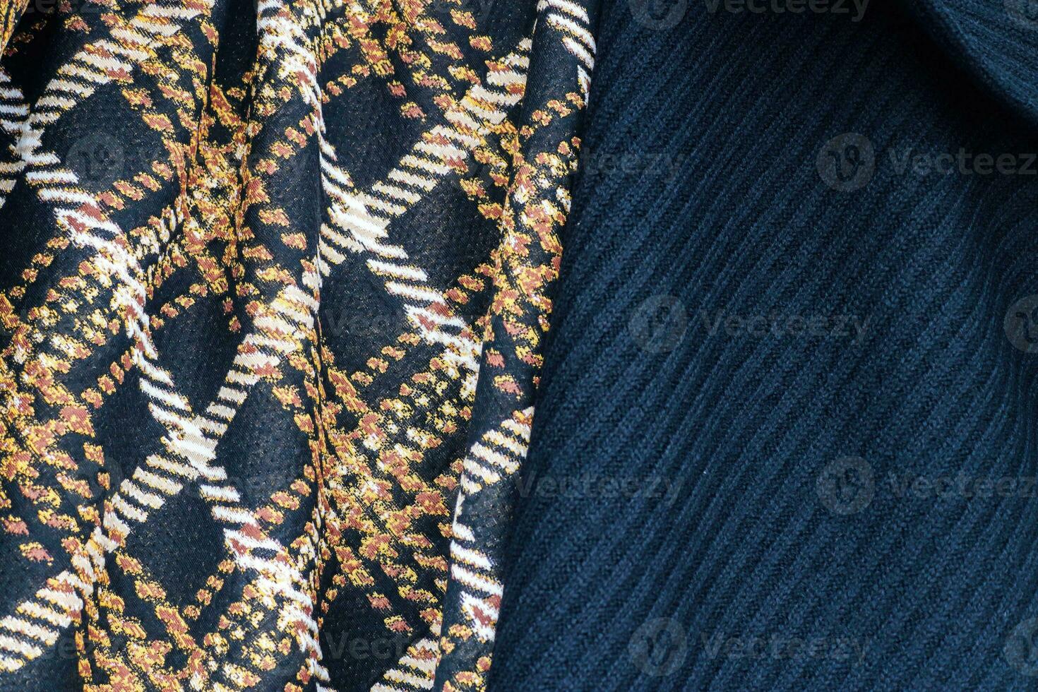 Close up view on samples of cloth and fabrics in different colors. photo