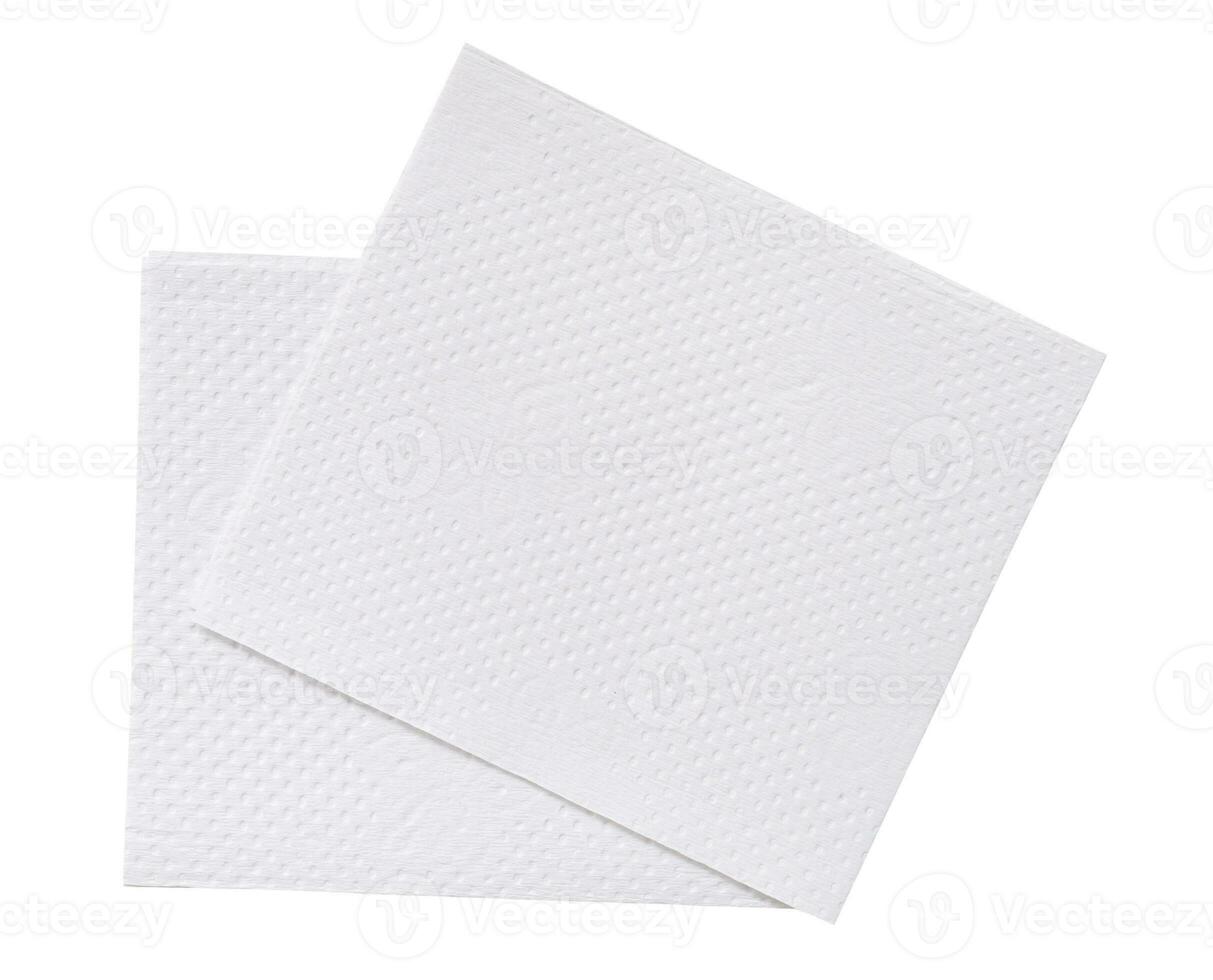 Top view of two folded pieces of white tissue paper or napkin in stack isolated on white background with clipping path photo