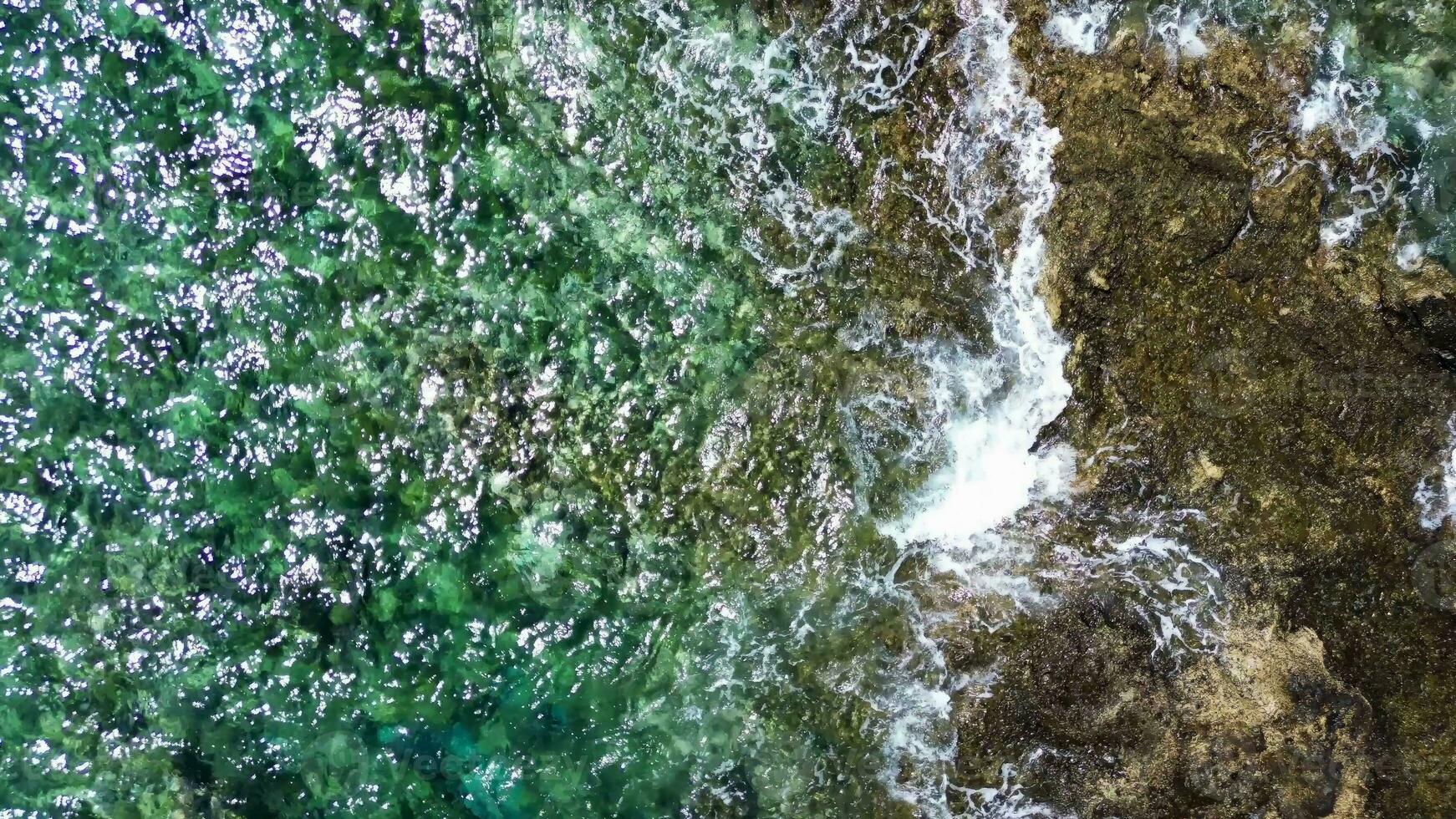 Big atlantic ocean waves meet the rocky coasts of the Canary Island of Tenerife photo