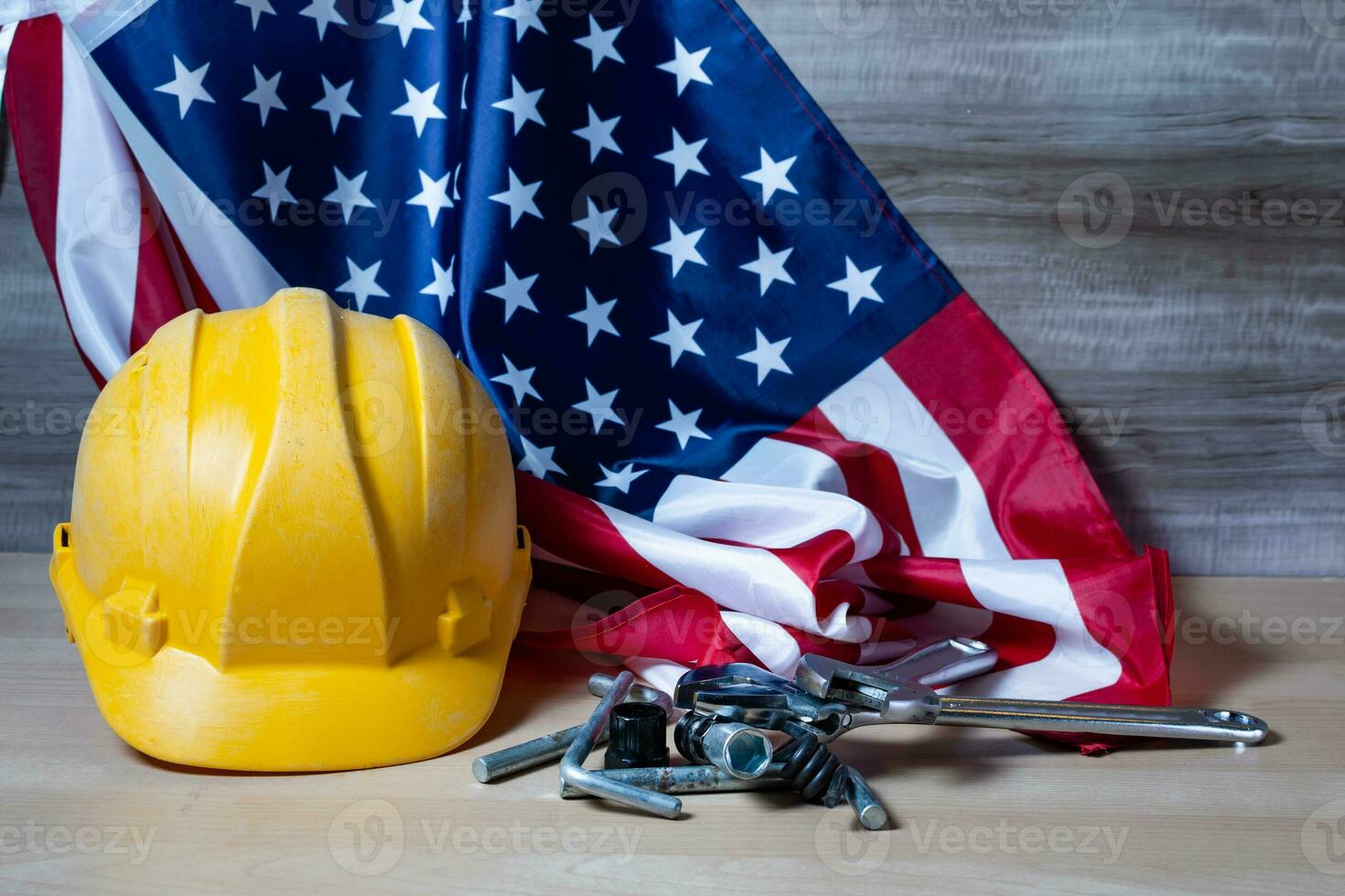 Labor day banner of tools and us flag. photo