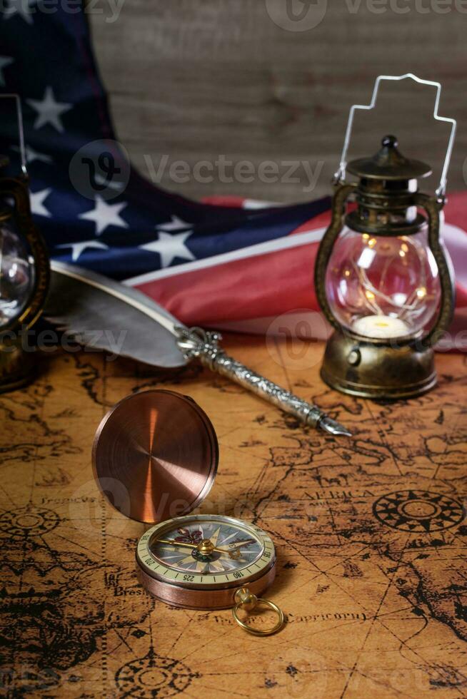 Happy Columbus Day. Vintage American flag over retro treasure manuscript. photo