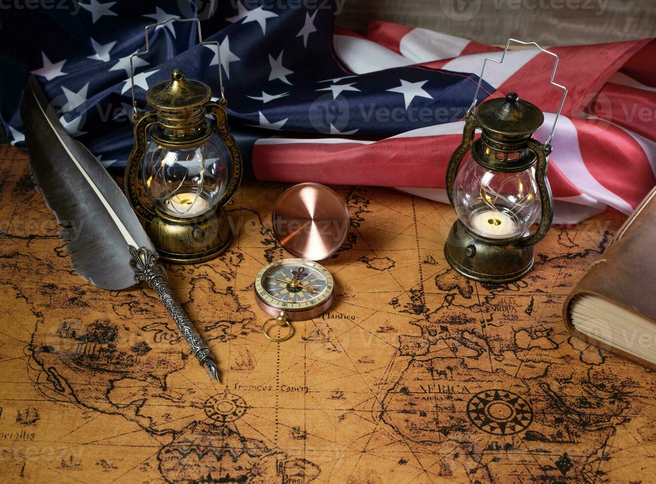 Happy Columbus Day. Vintage American flag over retro treasure manuscript. photo