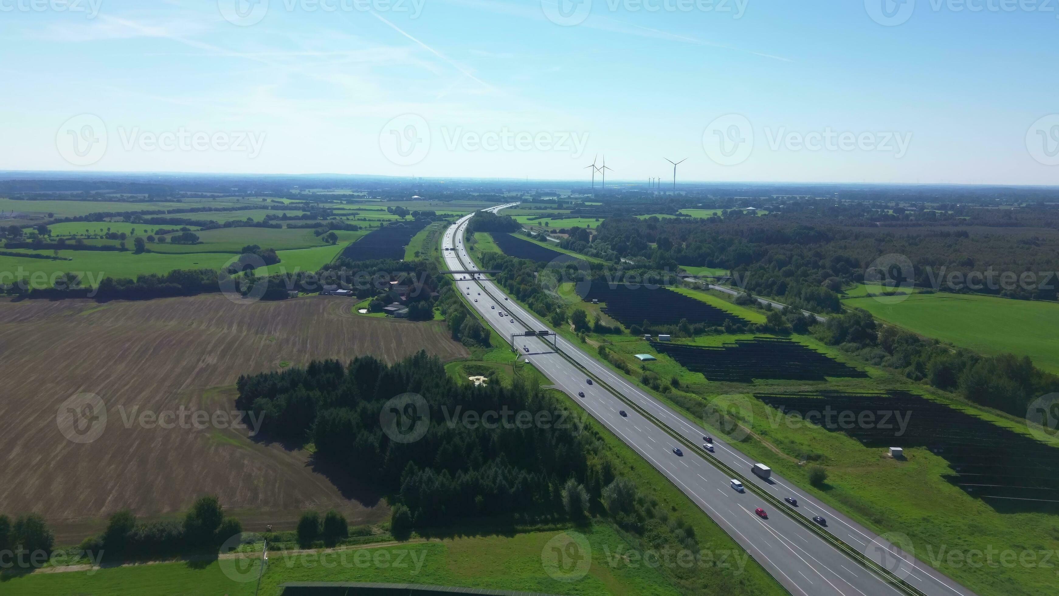 Aerial view on the A7 motorway in northern Germany between fields and ...