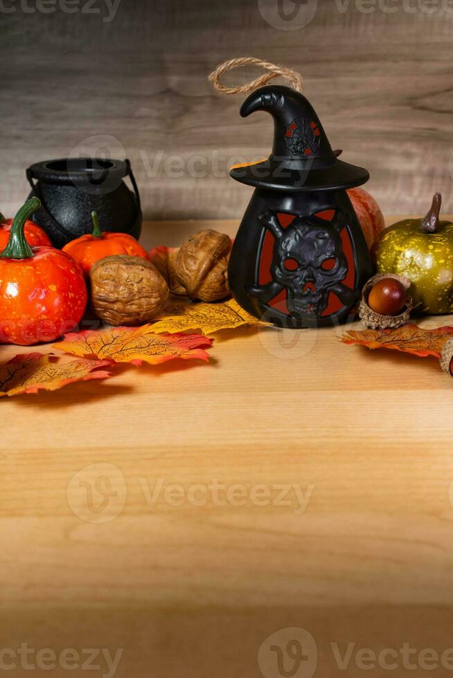 Halloween pumpkin with lantern on wooden. photo