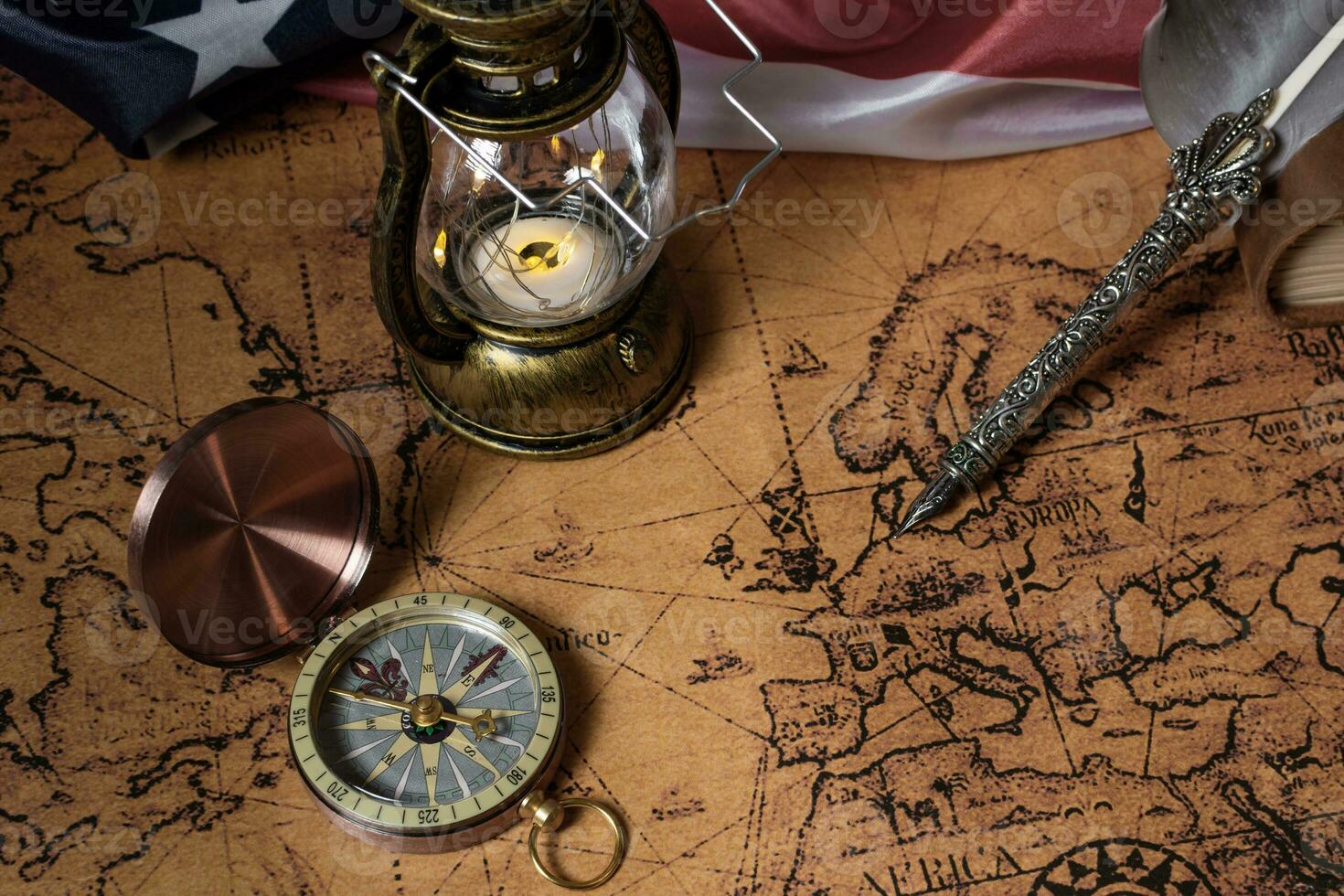 Columbus Day. Vintage world map and discovery equipment. photo