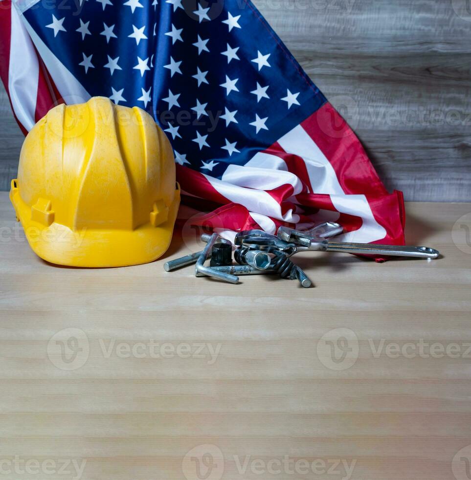 Labor day banner of tools and us flag. photo